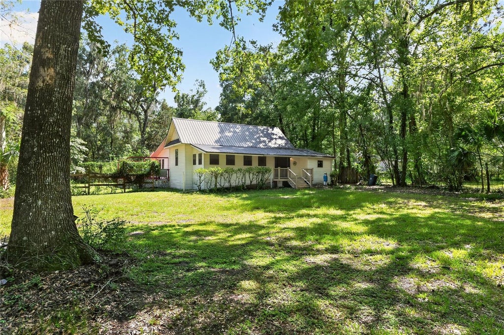 Photo of 9350 NW 230 Street, Micanopy, FL 32667 (MLS # GC543025)
