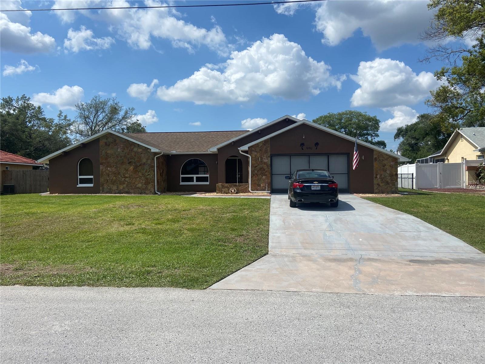 Come and View This Spacious Three Bedroom Two Bathroom Pool Home with many upgrades! Enjoy the Large Pool 14' x 28' With New Pavers, All new Screen, Privacy Screen, new pool pump. Amazing 12'X 28' Bonus Room Can Be Under Air! How about Entertaining in The Large Kitchen completely remodeled with high end GE SS Appliances with Lots Of Storage and Counter Space. No Worries about the Roof only 9 Years Old. AC is only 7 years old. All New Faucets and sinks. Feel Safe with Wired Security System. Well for the Sprinklers is why the Water Bill is Typically $10.00 per month. This Home Has Been Well Maintained, And the Seller Has All of The Documents To prove It! Septic Was Pumped in 2021. Whole House Water Filtration For Extra Peace Of Mind. This Home Will Not Disappoint and is Priced Very Well! Schedule Apt Today!