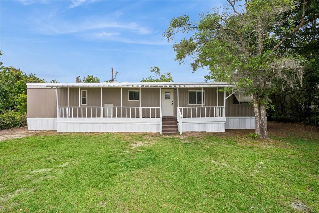 Photo of 18941 3rd Avenue, Orlando, FL 32820 (MLS # O6399997)