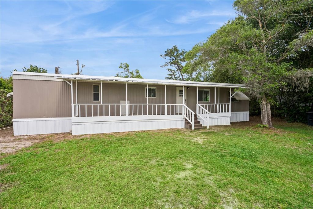 Photo of 18941 3rd Avenue, Orlando, FL 32820 (MLS # O6399997)