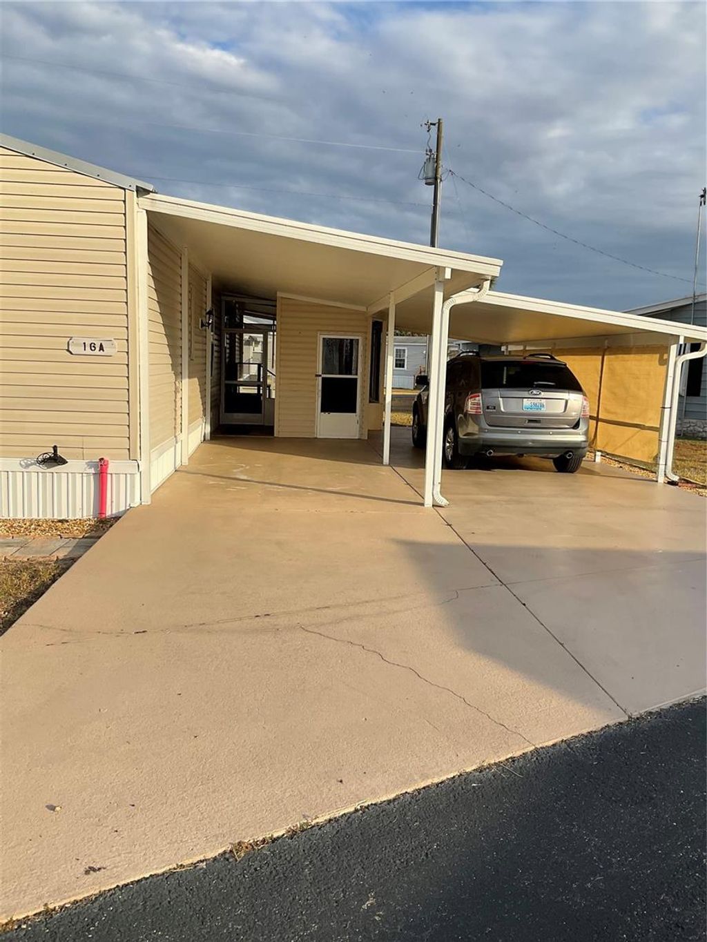 Photo of 1339 Old Lakeport Road #16A, Moore Haven, FL 33471 (MLS # OK225814)