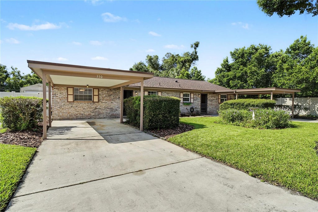 Photo of 330 E Evergreen Avenue, Longwood, FL 32750 (MLS # O6443106)