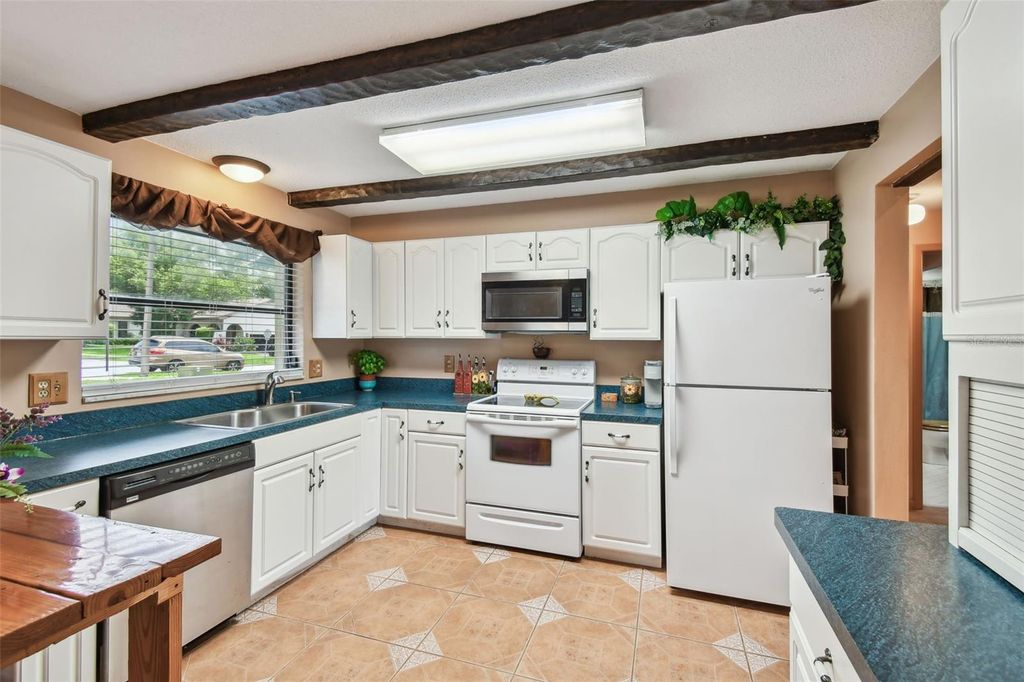 Photo of 855 Pinewood Terrace W, Palm Harbor, FL 34683 (MLS # TB8400193)
