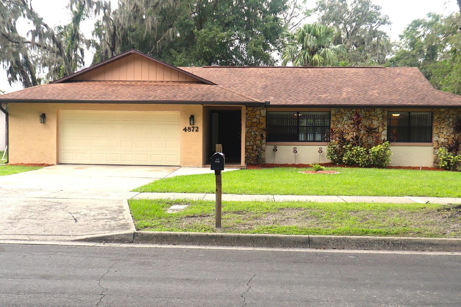 Welcome Home to this Spacious Three Bedroom Home nestled in Oak Tree Village. This home offers a split floor plan which provides privacy for it's large primary room. The primary bathroom feature his and hers sinks, stand up shower with two toilets, which one of those toilets is a bidet. The living room and dining areas have an open concept for entertaining. The Kitchen is fully equipped with all appliances: new refrigerator, new stove, microwave, and dishwasher. You can step into the family room and sit by the beautiful elegant tiled designed fire place. The back yard will amaze you as it is a nice fenced in space for entertaining. With this home you will definitely feel the need to host social gatherings out in the fully screened sun room that is great for game nights and for barbeques. Best of All is that there is NO HOA. There is a local community neighborhood center in the area that offers a fitness center, recreational activities, basketball court, playground and pool. You can join with an affordable, but optional membership fee. Buyer to verify all home measurements.