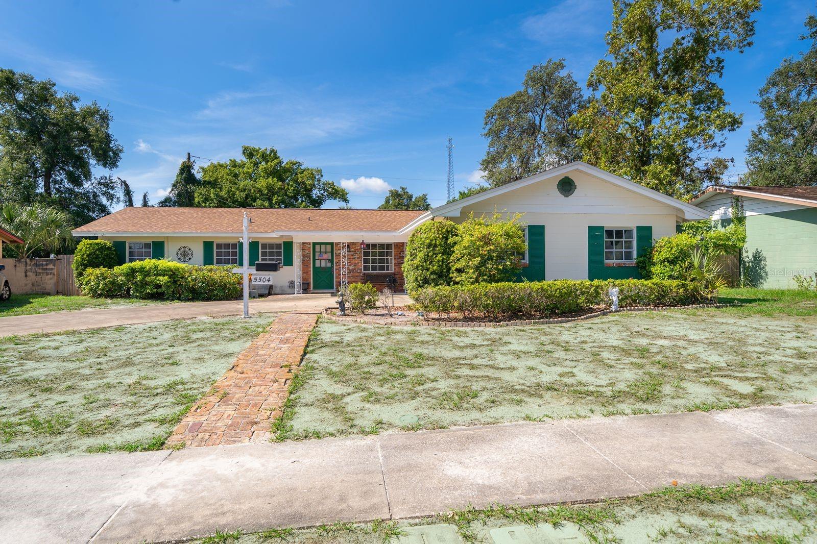 Come enjoy these hot summer days in your Concrete Block POOL HOME located in Forrest Park. This home is Large and Spacious and features 3 Bedrooms, 2 Full Bathrooms, with a Bonus Room and a Wood Burning Fireplace off the Dining Room. NEWER UPDATES INCLUDE: AC 2024, Roof 2023, Re-Plumb 2023, Newer Electrical Panels and New Garage Door. The Kitchen is Large and features a long Breakfast Bar with all major appliances: Fridge, Stove, Hood Vent and Dishwasher. Located off the Kitchen is the Dining Room area which is open to the Living Room area. All the Bedroons are located down the hallway. The Primary Bedroom has a private Ensuite Bathroom that features a Shower. The Hall Bathroom features a Shower and Tub combo. The Laundry is located in the Garage. The Garage is spacious to hold 2 cars and storage. Enjoy the nice-sized Backyard with a Large Pool that is big enough for the whole family and friends with an added Screen Enclosure as a bonus. There is also an Outside Shower and Hot Tub. The backyard is fully fenced. You don't want to miss this opportunity to make this house your home!