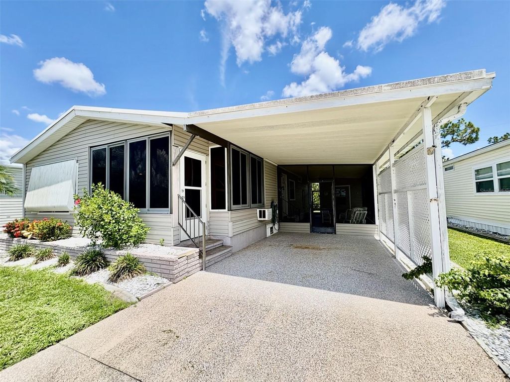 Photo of 113 Rarotonga Road, North Port, FL 34287 (MLS # N6140091)