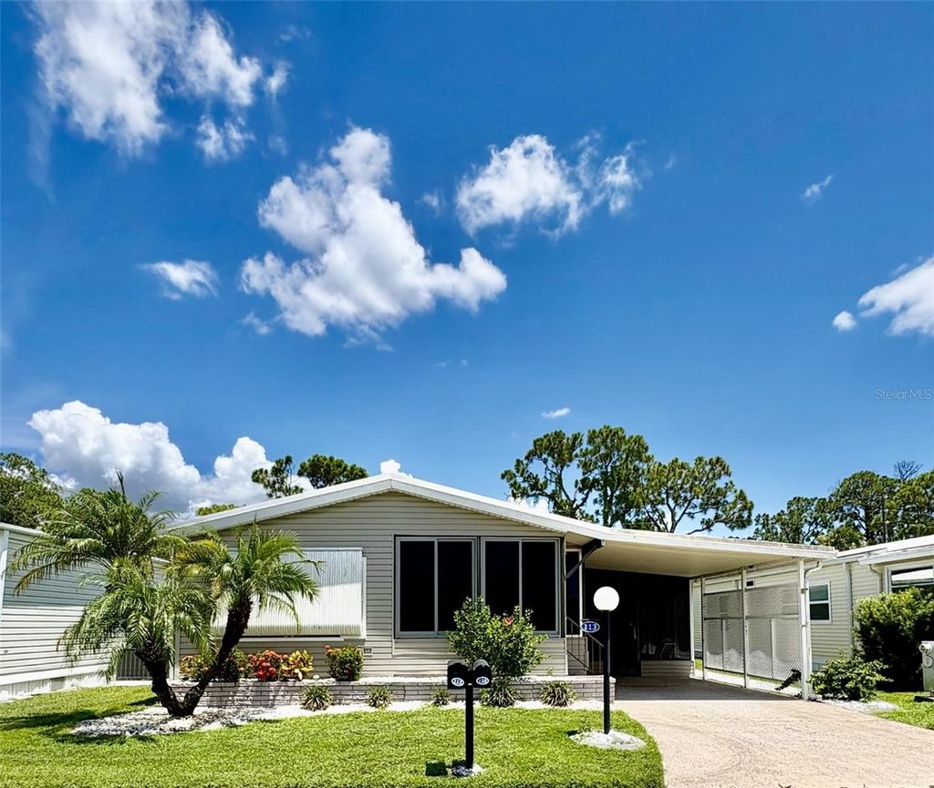 Photo of 113 Rarotonga Road, North Port, FL 34287 (MLS # N6140091)