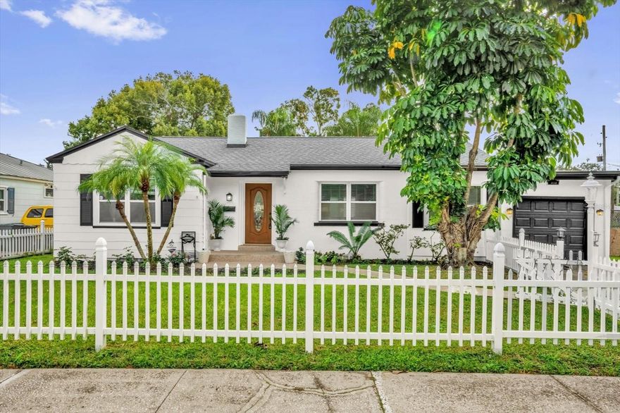 Discover this beautifully updated College Park bungalow, perfectly nestled in one of the area’s most desirable neighborhoods. This charming home blends warmth, character, and modern convenience with stunning custom details throughout—crown molding, built-in shelving, wide baseboards, and rich hardwood trim that elevate every room. Natural hardwood floors and abundant sunshine create an inviting atmosphere the moment you walk in.

The kitchen is a true standout, designed for both everyday cooking and effortless entertaining. Enjoy stainless steel appliances, granite countertops, a breakfast bar, wet bar, wine cooler, and an impressive amount of custom cabinetry. Large windows and double doors bring in gorgeous natural light and overlook the spacious, privacy-fenced backyard. Step outside to a huge patio and deck—perfect for relaxing, hosting, and enjoying Florida evenings under the lights.

Two oversized bedrooms are thoughtfully positioned on opposite sides of the home, each with nearby bathrooms, creating an ideal setup for dual primary suites. The third bedroom offers great flexibility as a home office, guest room, or creative space.

A major highlight is the 400 sq ft bonus living area, completely separate from the main home with its own private entrances. This studio-style space includes a full bath, efficiency kitchenette with granite countertops and custom cabinetry, full-size refrigerator, microwave, and 14” ceramic tile throughout. A removable pass-through window opens to the covered patio, looking out to the lush tropical backyard—perfect for entertaining or quiet retreats.

With all its charm, thoughtful updates, and versatile layout, this home offers incredible income potential—whether for guests, long-term rental, or extended family. This College Park gem truly checks all the boxes and is a must-see!