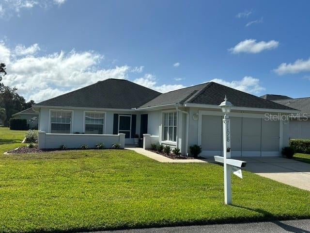 Photo of 7198 SW 113th Loop, Ocala, FL 34476 (MLS # OM734947)