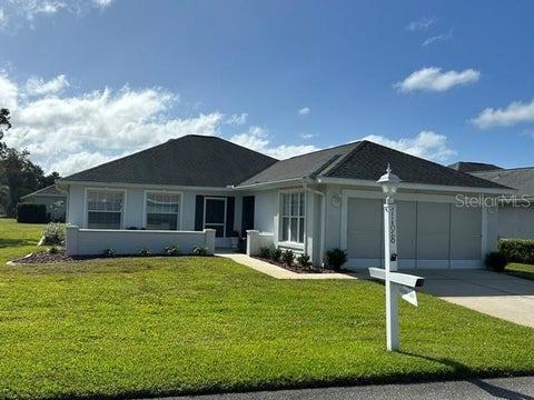 Photo of 7198 SW 113th Loop, Ocala, FL 34476 (MLS # OM734947)