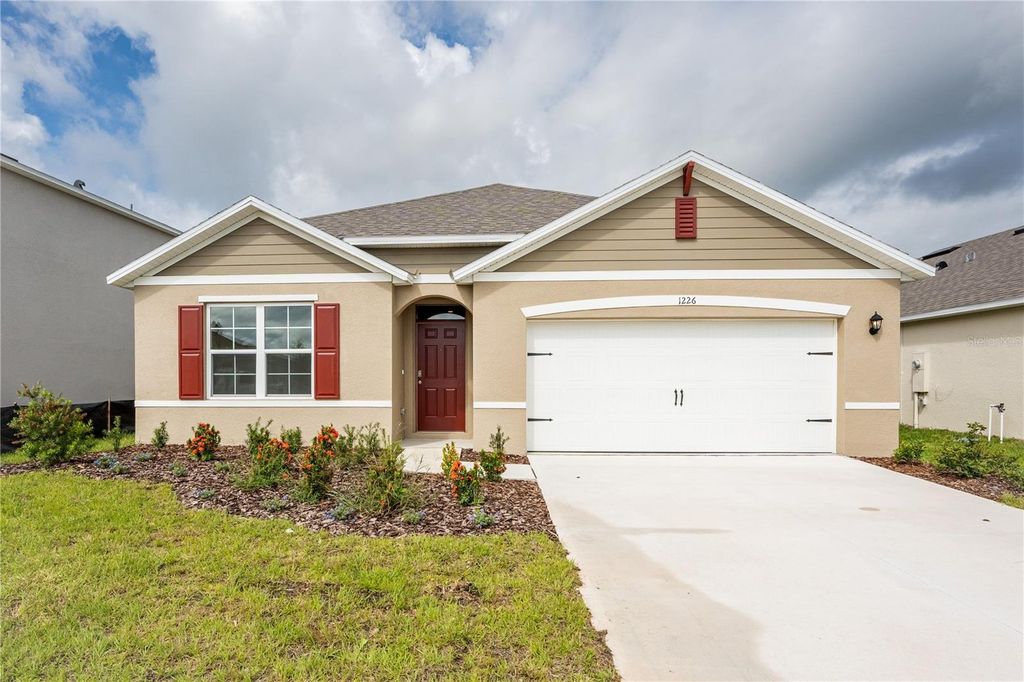 Photo of 1226 Red Hill Road, Davenport, FL 33837 (MLS # O6352611)