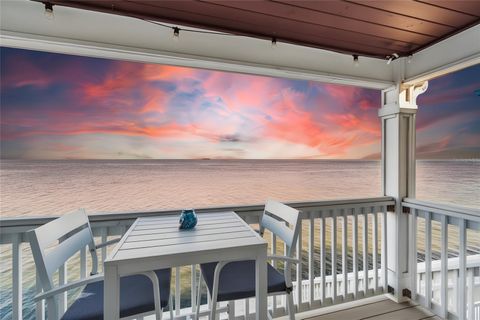 Photo of 5110 Coquina Key Drive SE #C, St Petersburg, FL 33705 (MLS # TB8473440)