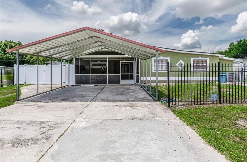 Photo of 8502 Trammell Trail, Tampa, FL 33619 (MLS # TB8473456)