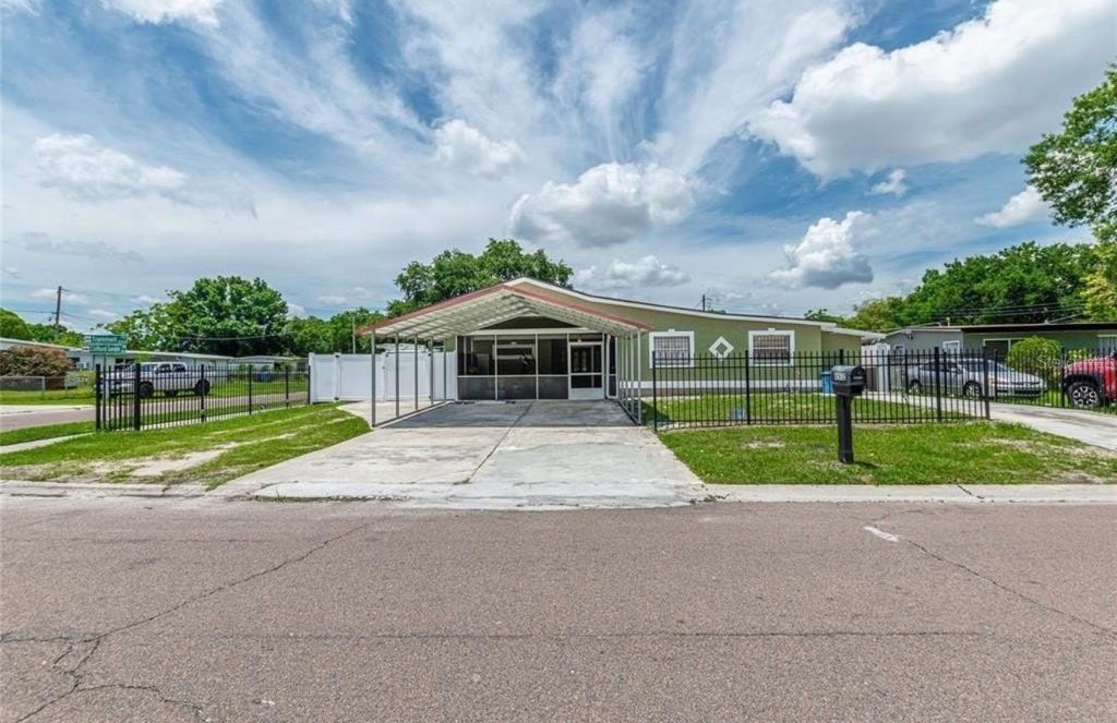 Photo of 8502 Trammell Trail, Tampa, FL 33619 (MLS # TB8473456)