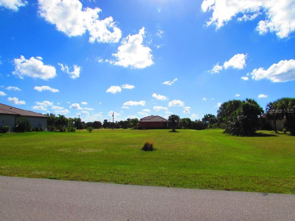 Looking for a nice lot? This is now an opportunity to purchase your very own Lot. Opportunity to secure a ready-to-build homesite in the growing Punta Gorda area. This oversized parcel offers both space and privacy while remaining close to shopping, dining, medical facilities, and quick access to I-75. Full set of building plans for a single-family residence has already been reviewed and approved by the county, saving valuable time and expense for the buyer. Seller is a licensed builder and can construct the approved home or work with the buyer to customize. Utilities available nearby. A great option for buyers looking to fast-track their new Florida home or for investors seeking a parcel with strong future potential. Ideal for an investor with an eye for future development. Hold onto for future growth potential in the area. Call for details. MOTIVATED OWNER!!!!. Great potential and possibilities. Call today to schedule your private showing. Here is your chance to own your own property!!!