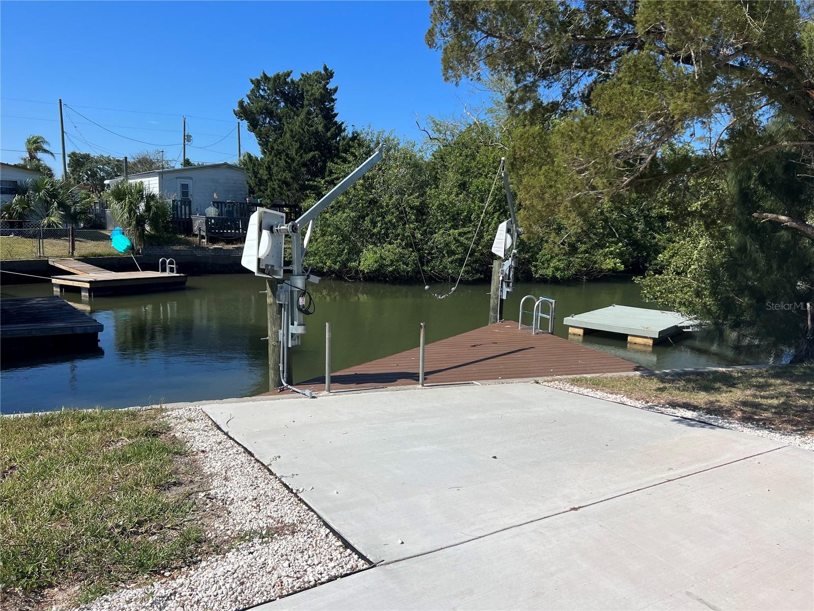 DIRECT GULF OF MEXICO ACCESS LOT WITH DOCK & NEW BOAT LIFT DAVITS!
This rare Gulf Coast lot offers 42+ feet of saltwater canal frontage with a concrete seawall, fixed dock, and new boat lift davits—giving you quick, direct access to the Gulf of Mexico with no fixed bridges in your way. Enjoy effortless boating, fishing, and sunset cruises right from your own backyard.
The property features a concrete driveway, parking pad, electrical pole, and water tank already in place—making it an ideal foundation for your dream coastal home or weekend getaway. Buyer is responsible for verifying street address with the county and conducting any desired due diligence or inspections.
From your dock, watch dolphins and manatees glide through the water and reel in redfish, snook, and snapper without ever leaving home.
Welcome to Hudson Beach – a laid-back, Old Florida coastal haven just north of Tampa along the enchanting Gulf Coast. Here, recreational fishing, boating, and waterfront living come together in a community that still reflects the charm of Key West in the 1970s. Enjoy local marinas, waterfront tiki bars, and restaurants with breathtaking Gulf sunsets. Spend the day at the small public beach, mingle with friendly locals, or explore the active commercial seafood scene specializing in shrimp and stone crab.
Hudson Beach offers a diverse mix of waterfront communities to fit every lifestyle—whether you’re dreaming of a quaint cottage or a spacious Gulf-view home. Conveniently located off US 19, you’re close to shopping, dining, hospitals, and only an hour from Tampa International Airport or 90 minutes to the magic of Disney.
If you’ve been searching for the perfect place to build your Gulf Coast Fishing Home, this is it. Bring your vision, your boat, and your love for the water—Hudson Beach is waiting.