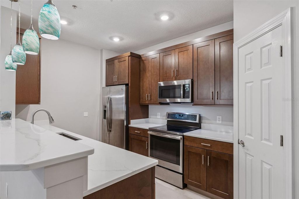 Photo of 2484 San Tecla Street #105, Orlando, FL 32835 (MLS # O6412534)