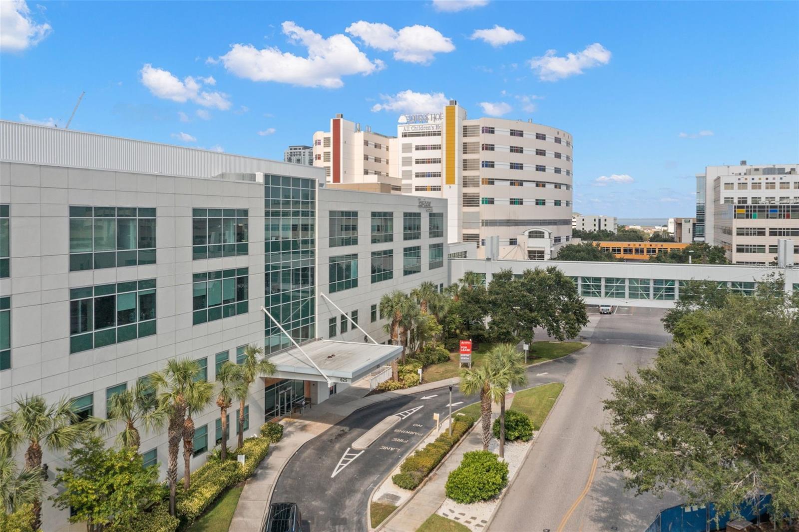 Medical office for sale conveniently located to Bayfront and All Children's Hospital. This 4th floor large medical condo features 8 offices with reception area, nurse station, 2 EEG Rooms, and viewing/procedure room, conference/break room, and interior rest room in addition to common area rest rooms on every floor. This space features 3,704 sq ft and is already built out for use as a pediatric office. Lots of natural light and plenty of space to work. Join a host of professional offices in this well appointed property. Many amenities to the campus including air conditioned skywalk ways connecting Orlando Bayfront Medical Center and John Hopkins All Children's Pediatric Hospital. Lots of free parking available in the attached 8 story parking garage. Free valet parking included as well. Property is well maintained and professionally managed. 24/7 security and access control. Well located close to downtown and I 275. Exciting medical office opportunity for someone seeking an office with a great location and amenities.