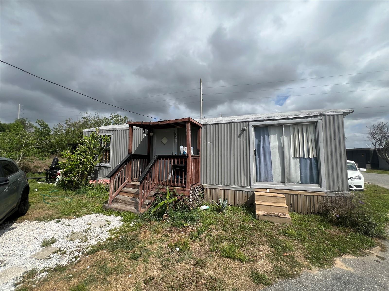 LAKE JOHNS MOTEL APTS. & TR. PK - Residential Income