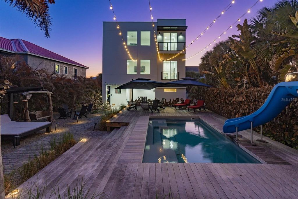 Photo of 6480 S Atlantic Avenue, New Smyrna Beach, FL 32169 (MLS # O6381621)