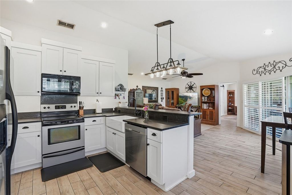 Photo of 554 Andorra Circle NE, St Petersburg, FL 33703 (MLS # TB8499157)