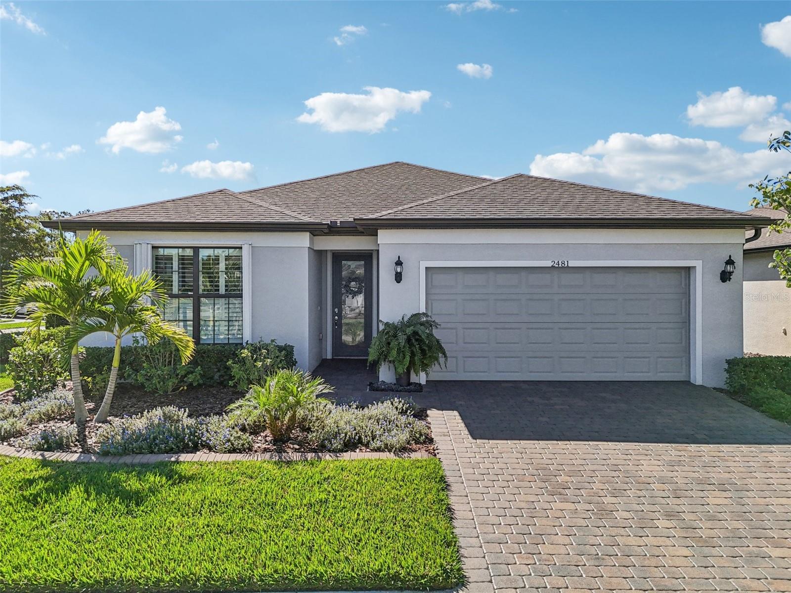 Stunning 3-Bed, 2-Bath 2023 Pool Home on Corner Lot with Water View & Custom Upgrades, ideally situated on a spacious corner lot in a serene, sought-after Cedar Grove Community.  Enjoy true Florida living with breathtaking water views right from your backyard, complemented by a sparkling private pool—perfect for relaxing or entertaining year-round. Enjoy no maintenance landscaping,
This home features custom Elite Hurricane remote controlled ballistic screens for the lanai area, remote controlled accordion shutter for the front door, and mounted bronze colored accordion shutters for the windows. Home is WIRED for Smart Home application if desired, for ultimate peace of mind and convenience.  Zebra custom electric blinds on sliders and dining room windows.  The open-concept layout offers abundant natural light, a spacious living area, tray ceilings in living area and master suite and a well-appointed kitchen with modern finishes and ample storage.  Attached extended 2-car garage with epoxy floor.
Step outside to your private oasis with a screened lanai and pool area—ideal for morning coffee or evening sunsets. Lanai area has water, electric, and vent installed for future outdoor kitchen.   
Conveniently located near Interstate 75, shopping, restaurants, parks, schools, medical, Cool Today Park, Tampa Bay Rays ballpark, downtown Wellen Park and the beautiful pristine beaches of the Gulf of Mexico!
Don’t miss this rare opportunity to own a move-in-ready home with premium features, upgrades and views in North Port, Florida!  Schedule your private tour today and experience Florida living at its finest!