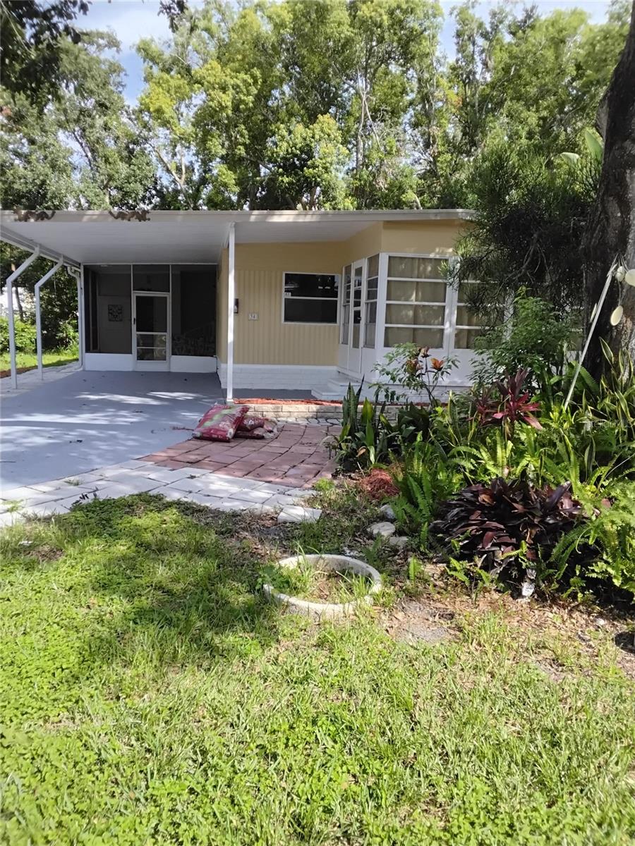 Welcome to this charming mobile home located in the peaceful community of Safety Harbor. This well-maintained property features 2 bedrooms and 2 bathrooms. Home is move in ready, freshly painted with new carpet in bedrooms. New ac duct work underneath and on ground vapor barrier. House has never been flooded. HOA, includes water, lawn service, trash pick up, use of pool and spa. Less than 1 mike from Mease Countryside Hospital, 30 minutes from Tampa International Airport and 30 minutes from Honeymoon Island. Enjoy the Florida sunshine in the outdoor area or take advantage of the nearby local amenities and parks. Experience relaxed living in a convenient location.