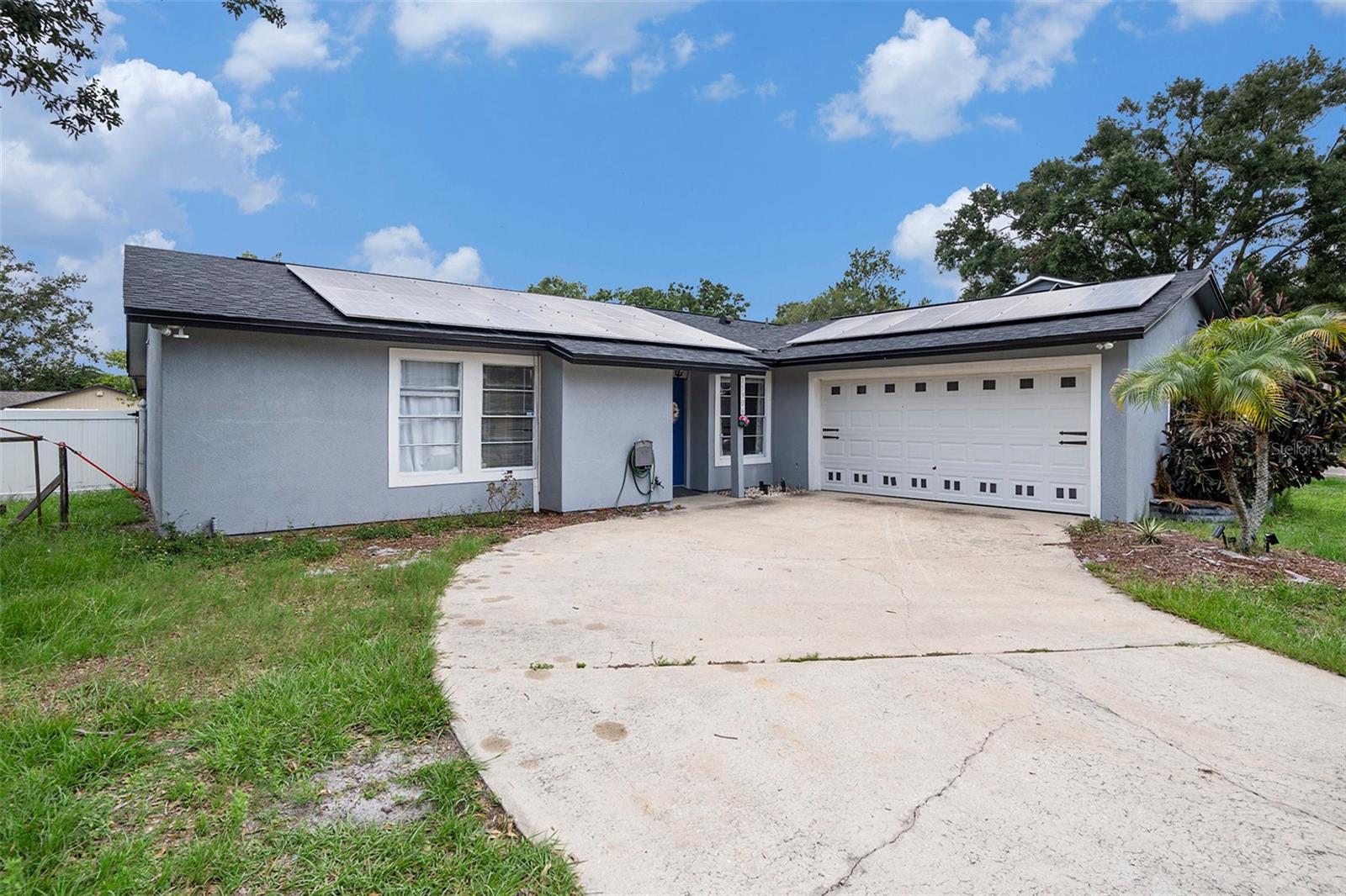 Say hello to this spacious family home, located by a cul-de-sac in the quiet & wonderful Carrollwood area - this is 15906 Country Farm Place! Step inside this thoughtfully redone, open style entertainment space haven! From accent walls, to extra storage, dedicated spaces and a large backyard, this home fits all your needs! An inside laundry room with space for folding, a split bedroom layout to create privacy to the primary and a kitchen with enough counter space for a few chefs to cook! It also has an attached 2 car garage, a long driveway for ample parking and a full sized gate on the privacy fence, you can store all your cars, bikes and more. The home has quick access to the Veteran’s Expressway and Dale Mabry Avenue which will get you to anything & anywhere you need or want! Make sure to schedule your private showing today, come see this in person and start making memories in this home!