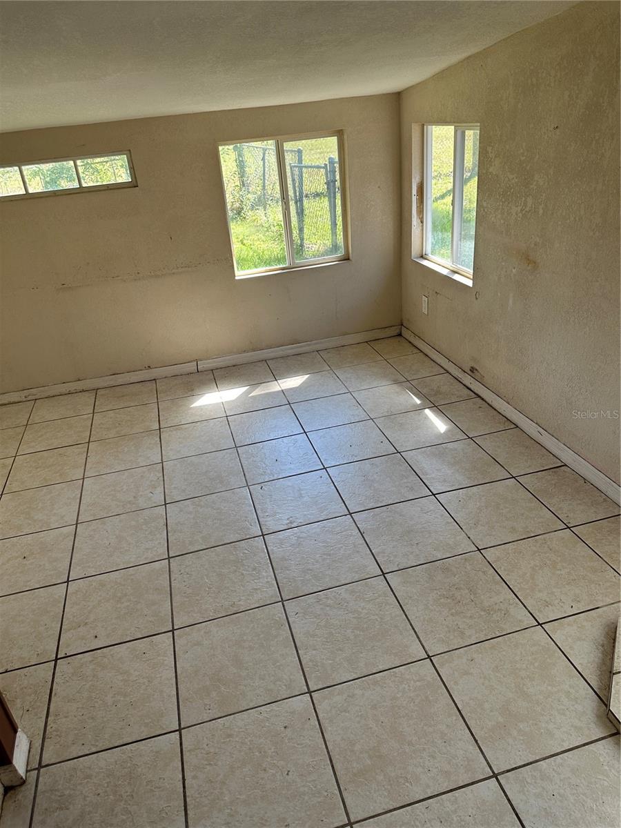 SEC 12 TWP 12 RGE 23 E 144 FT OF W 210 FT OF S 210 - Residential