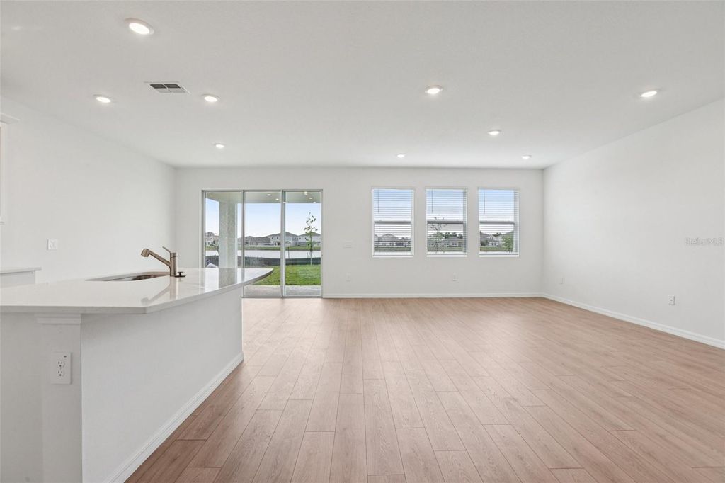 Photo of 5392 Cloudberry Ave, Lakeland, FL 33811 (MLS # O6371101)
