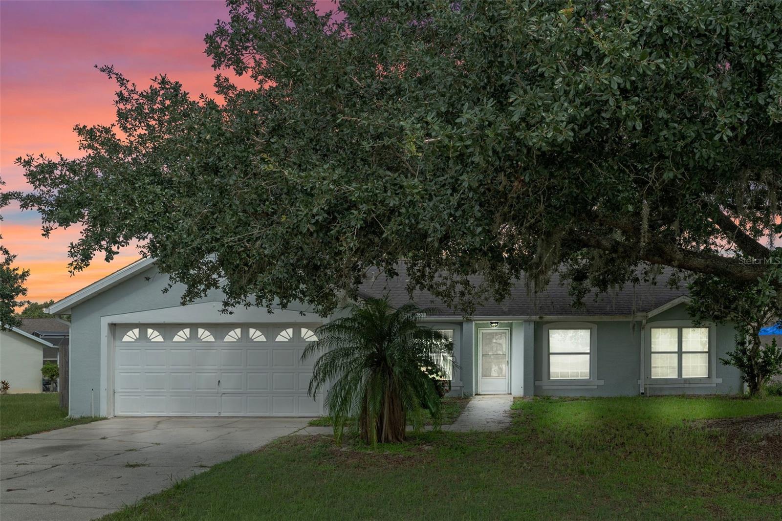 Welcome to your next home sweet home! This 3-bedroom, 2-bathroom home sits on a spacious 0.33-acre lot and offers the perfect mix of comfort, space, and a convenient location. Whether you're looking for a primary residence, vacation getaway, or a smart investment, this place checks all the boxes. Inside, you'll find a formal dining space that flows into the living room. The kitchen has a casual eat-in space, as well as, a breakfast bar. This home features a split bedroom floor plan. The primary bedroom features a walk-in closet plus an en-suite bathroom with dual sinks, a tub, and a separate shower. Schedule your showing today and step out back to enjoy the peace and quiet of your oversized lot!