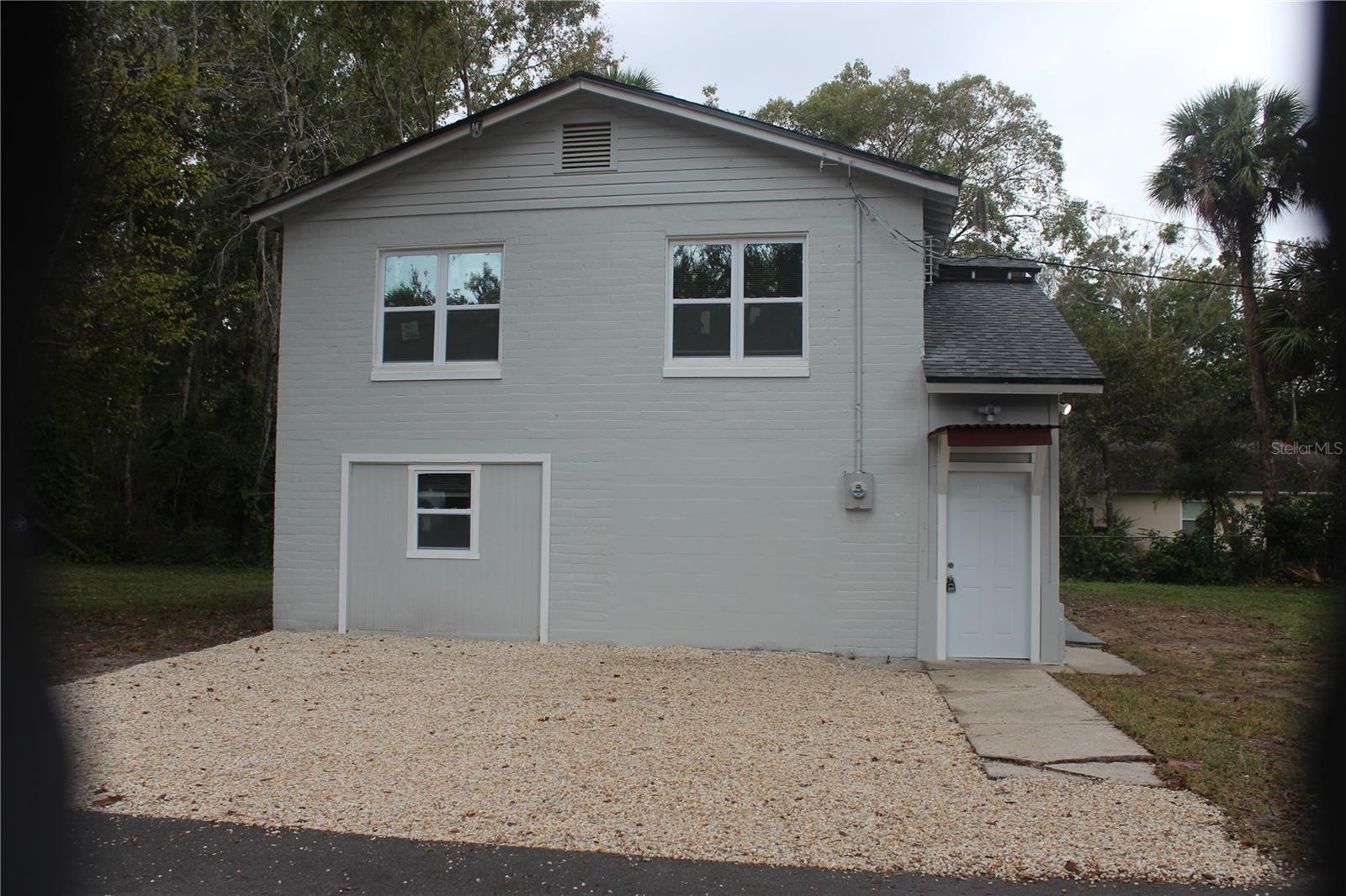 Motivated Seller! Prime Opportunity 2 miles from the ocean in Daytona Beach - Make this completely renovated adorable 3/2 single family 2 story home your own - perfect starter home with investment potential. All-new stainless steel appliances, brand new A/C, Roof, windows and flooring throughout. Bring all your mechanical toys! The property includes RV parking, a jet ski platform, and motorcycle parking. For investors, explore the lucrative possibilities of Airbnb or VRBO for part or the entire property.