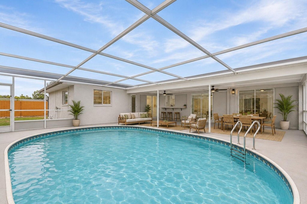 Photo of 1306 SE 21st Lane, Cape Coral, FL 33990 (MLS # O6442982)