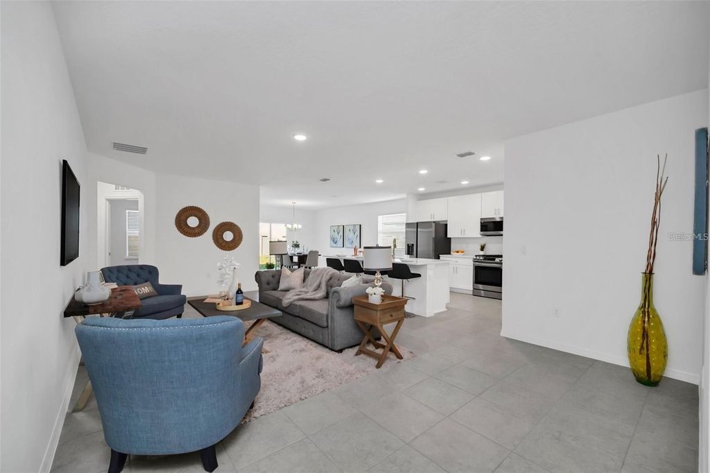 Photo of 1154 Oak Bluff Drive, Davenport, FL 33837 (MLS # O6382541)