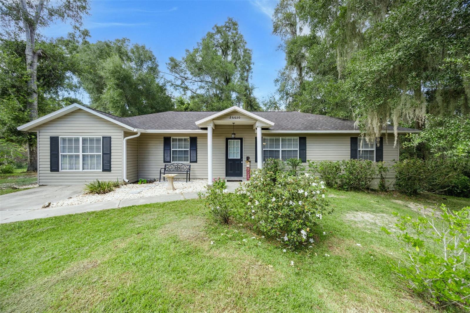 Welcome to this beautifully maintained 4-bedroom, 2-bath home located in one of Alachua County's most desirable communities. With over 1,500 square feet of living space, this affordable gem is perfect for first-time buyers or anyone looking for a move-in-ready home in a thriving area.
Step inside to a spacious split floor plan featuring easy-care laminate wood flooring in the main living areas and plush carpet in the bedrooms. The updated kitchen boasts ceramic tile flooring, stunning granite countertops, and stainless steel appliances—perfect for everyday cooking and entertaining.
The oversized fourth bedroom offers flexibility to suit your needs and can easily function as a home office, playroom, or hobby space. Both bathrooms are well-appointed, and the home includes major updates completed in 2018, including a new roof and A/C system for peace of mind.
Enjoy the open, fenced backyard with a peaceful wooded backdrop—ideal for relaxing, playing, or gardening. A huge storage shed provides ample space for tools, equipment, or seasonal items.
Conveniently located near top-rated schools, parks, and local amenities, this home offers comfort, value, and location—all in one! Don’t miss your chance to own this wonderful home in excellent condition at an affordable price.