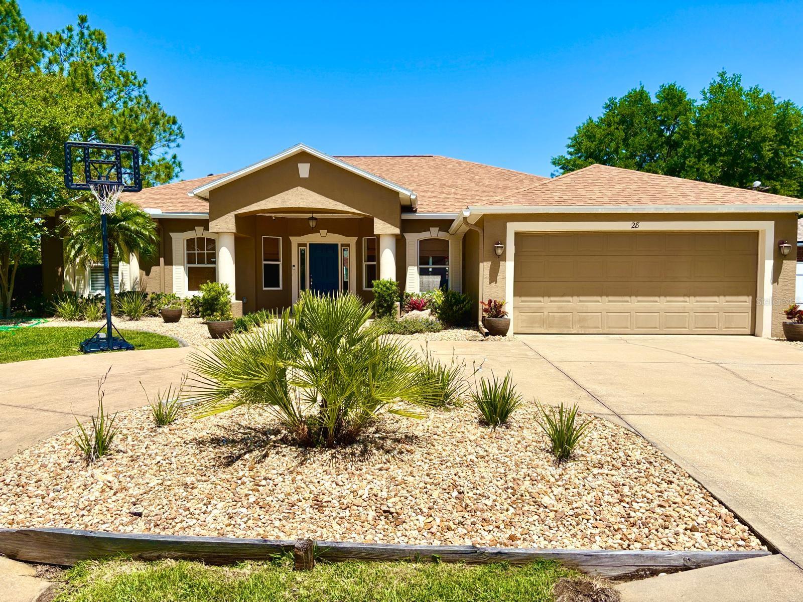 Beautifully Upgraded 4-Bedroom Home with Saltwater Pool – Just Minutes from Beaches and Shopping! This stunning home offers 2,263 sq ft of thoughtfully designed living space—perfect for both everyday comfort and entertaining guests. From the moment you enter, you’ll appreciate the formal dining and living areas, along with a separate family room and cozy dinette conveniently located near the kitchen. Enjoy the stylish open-concept layout featuring brand-new luxury vinyl plank flooring, gorgeous granite countertops, and an elegant electric fireplace that adds warmth and character. Step outside to your own private oasis: a solar-heated saltwater pool, ideal for relaxing and hosting friends and family year-round. This home is truly move-in ready, complete with valuable upgrades such as plantation shutters throughout. Best of all, you’re just 30 minutes from five beautiful beaches and only 11 minutes from Island Walk, Palm Coast’s premier shopping and dining destination. Don’t miss your opportunity—schedule your private showing today and discover the home you've been searching for!