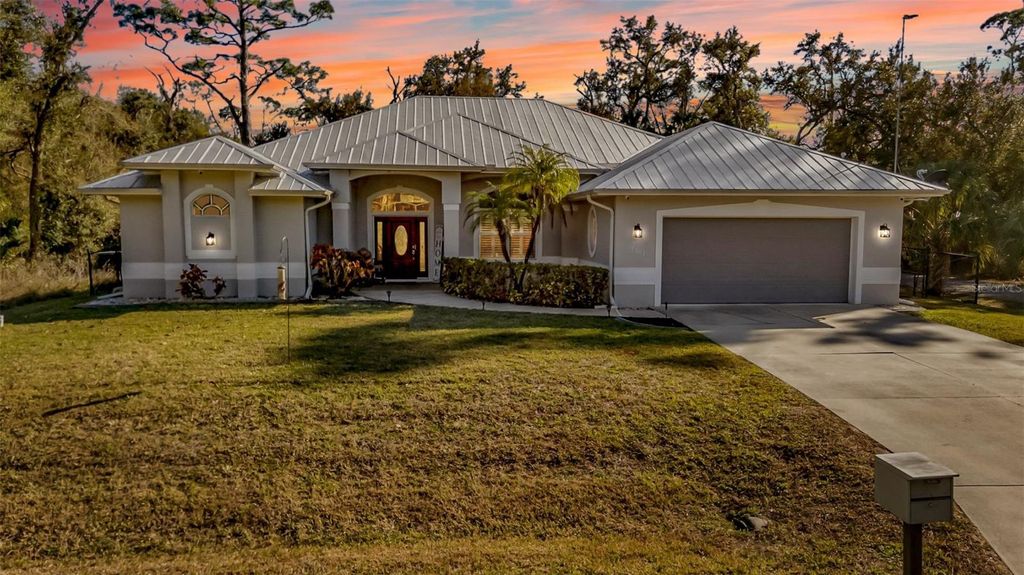 Photo of 17363 Wellsley Avenue, Port Charlotte, FL 33954 (MLS # C7522176)