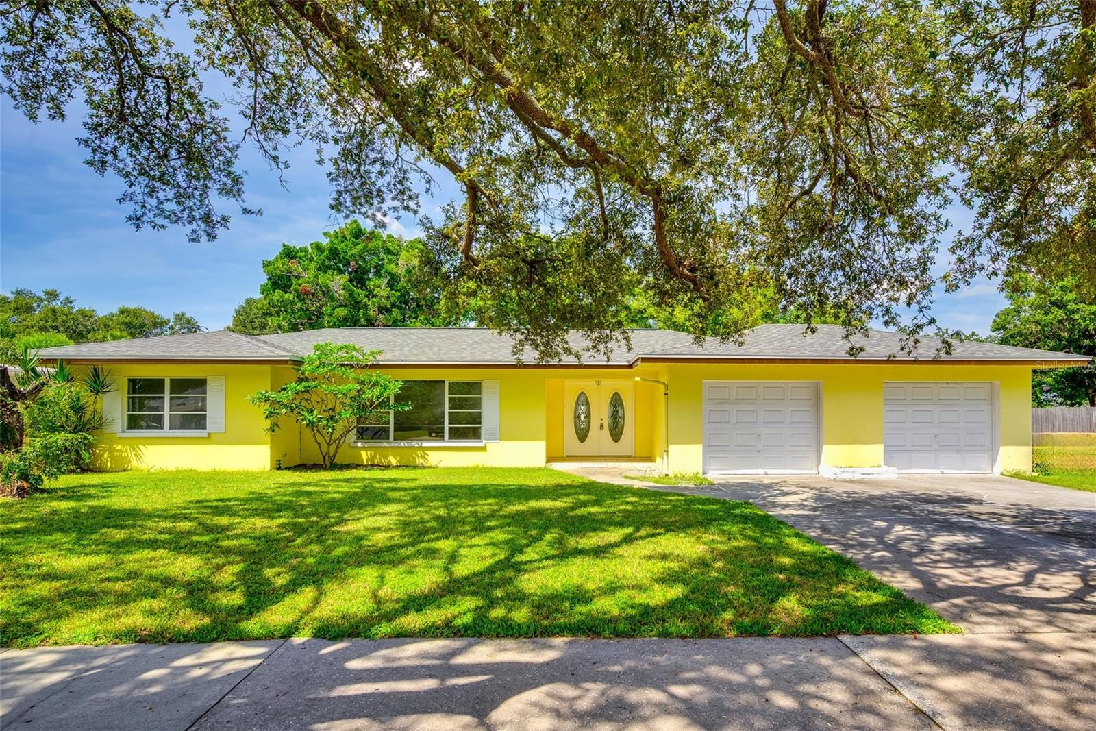 Welcome to 104 S Hercules Avenue — a fully renovated Clearwater stunner where timeless mid-century charm meets today’s modern comforts. Nestled in the desirable Sky Crest neighborhood with no HOA, this home is move-in ready and packed with upgrades designed to impress.
Step inside and be greeted by a bright, open floor plan with sleek new finishes throughout. The heart of the home is the all-new kitchen, featuring stainless steel appliances, quartz countertops, custom cabinetry, and designer lighting that makes cooking and entertaining effortless. The seamless flow into the dining and living areas creates an airy, welcoming space perfect for gatherings or quiet evenings at home.
This home offers 3 spacious bedrooms and 2 beautifully updated baths, complete with modern tile, upgraded vanities, and stylish fixtures. Every detail has been thoughtfully chosen to provide both function and flair. New flooring carries throughout the home, tying the entire space together with a clean, contemporary feel.
Enjoy the peace of mind that comes with a brand-new HVAC system, ensuring comfort year-round, plus all-new appliances that make this home truly turnkey. Even the little details — new doors, trim, hardware, and lighting — shine with fresh style.
Outside, the oversized lot (over 13,000 sq ft) offers a fully fenced backyard with room to relax, garden, or entertain. Mature trees add shade and privacy, while the 2-car garage provides ample storage and workspace. Whether you envision summer barbecues, a play area, or even a pool addition, the backyard is a blank canvas for your lifestyle.
Practical updates like a newer roof and block construction provide long-lasting durability. With public water and sewer, central heating and cooling, and no flood insurance required, ownership here is as convenient as it is beautiful.
The location seals the deal: minutes to Downtown Clearwater, Coachman Park, world-famous Clearwater Beach, shopping, dining, and top-rated schools. Easy access to US-19 and Gulf-to-Bay Blvd makes commuting a breeze, while still keeping you close to the coastal lifestyle Pinellas County is known for.
Key highlights:
Fully renovated interior with all new appliances
Brand-new HVAC system for efficiency and comfort
3 bedrooms, 2 upgraded baths
Spacious open layout with designer finishes
Oversized fenced lot with 2-car garage
No HOA, fee simple ownership
Minutes from beaches, parks, and Downtown Clearwater
This home truly blends style, function, and peace of mind — making it a must-see for buyers who want a modernized home in one of Clearwater’s most convenient neighborhoods.