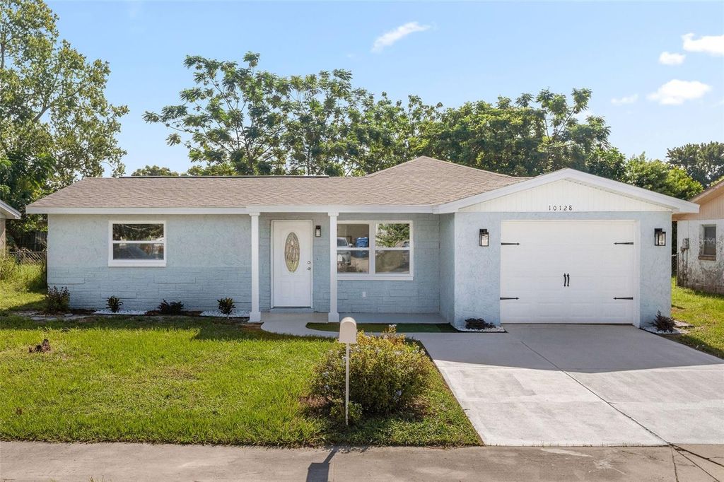 Photo of 10128 Cherry Creek Lane, Port Richey, FL 34668 (MLS # TB8422268)