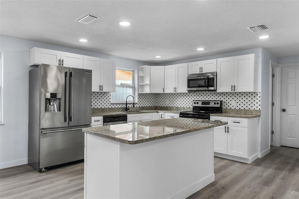 Photo of 10128 Cherry Creek Lane, Port Richey, FL 34668 (MLS # TB8422268)