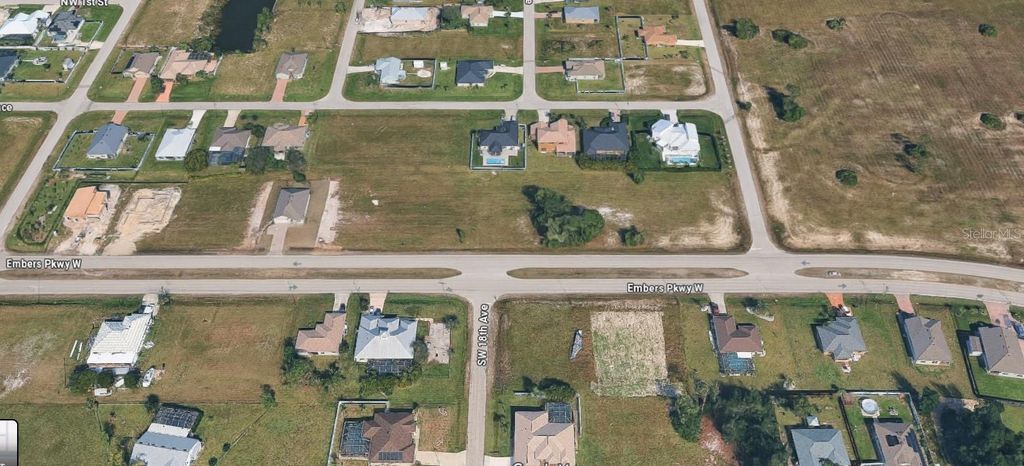 Photo of 1801 Embers Parkway W, Cape Coral, FL 33993 (MLS # O6367194)