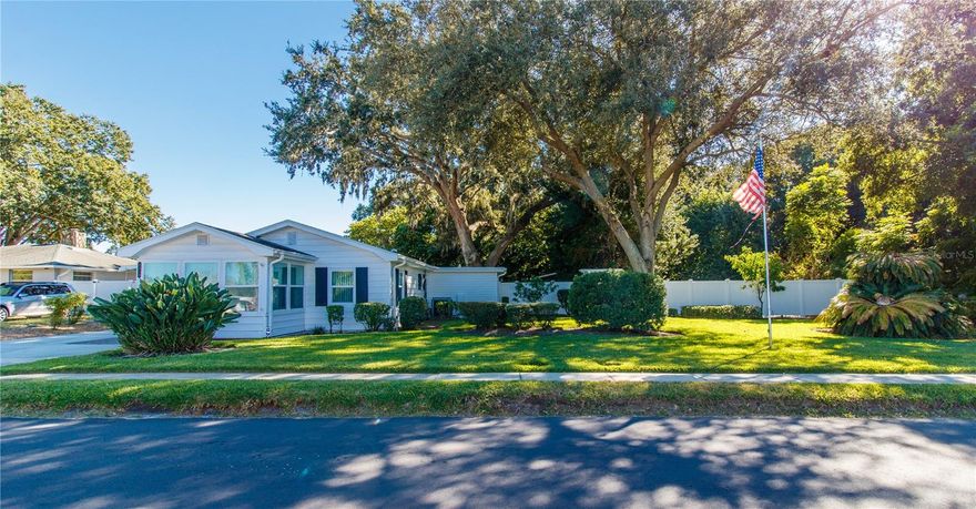 RARE FIND!!! VINTAGE HOME  BLT IN 1946-- ON ALMOST ONE-HALF ACRE -- CENTRALLY LOCATED. You'll appreciate the Old Florida feel and appearance of this 2 bedroom - 2 bath home and an UNBELIEVABLE BACKYARD with its garden like setting complete with lush landscaping, majestic oak tree, winding walkway, brick patio for entertaining, and koi pond with rock waterfall- a rare relaxing oasis.  Upon entertaining the home you will find a separate seating area leading into the living room with a small fireplace on the wall.  To the right is the secondary bedroom or office and bath with comfort height vanity, updated toilet, solar tube for natural lighting, and tub surrounded by fully tiled wall.  Just beyond is the open family room with faux brick accent wall and kitchen with island that also serves as a breakfast bar.  Just beyond the kitchen is a spacious separate dining area with large pantry and French doors.  The primary suite also has French doors leading to the brick, covered porch and  has triple closets with custom built-in drawers and shelving.  The en suite bath features an additional double closet with built-ins, updated toilet and fully tiled walk-in corner shower.  The expansive vanity even has a beauty station.  An open floor plan - crown molding throughout - recessed lighting further enhance this UNIQUE HOME.  For your laundry needs you'll find the washer/dryer housed in the laundry room inside the garage.   You won't believe the OVERSIZED WORKSHOP with generous shelving for storage, and utility tub. The Garage Floor is Mint cleaned also.  Lot Size is 108x140  (Backyard Fenced) -- HUGE.  Seller's mother was original owner.  Pasco County Permits show:  Reroof - 2013, Reroof for flat deck 2012, Air Conditioning 2012.  This is a very  distinctive home and land.  Check this one out. Foundation is Continuous  Footing.  Public Records list Square Footage as 1207.  Appraiser measured 1315.