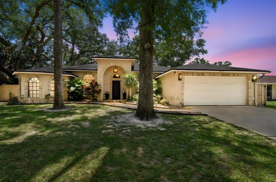 Ideally located in the heart of Carrollwood with no HOA, this beautifully renovated custom home sits on a spacious corner lot of more than 1/4 acre just two blocks from Dale Mabry. Featuring a desirable split-bedroom floor plan, the home offers 4 bedrooms, 2.5 bathrooms, and a newly updated kitchen complete with maple cabinetry and elegant honed marble countertops. High ceilings, plantation shutters, and custom millwork throughout add timeless character and style.

The private primary suite boasts dual closets with custom built-ins, dual vanities, a whirlpool tub, and a separate shower. Multiple living spaces include a formal living room that can easily function as a home office, a formal dining room, and a welcoming family room with French doors opening to the expansive fully fenced backyard. The extended paver lanai creates the perfect setting for outdoor entertaining.

Additional highlights include a saltwater fish tank, central vacuum system, outdoor shed, playground, and a double-wide side gate installed by the seller, providing convenient additional parking space in the side yard. Recent improvements include brand-new flooring, a new roof installed in 2020, and exterior paint completed within the last few years. Situated on a picturesque tree-lined street in a non-deed restricted community, this exceptional home combines space, comfort, and convenience in one prime location.