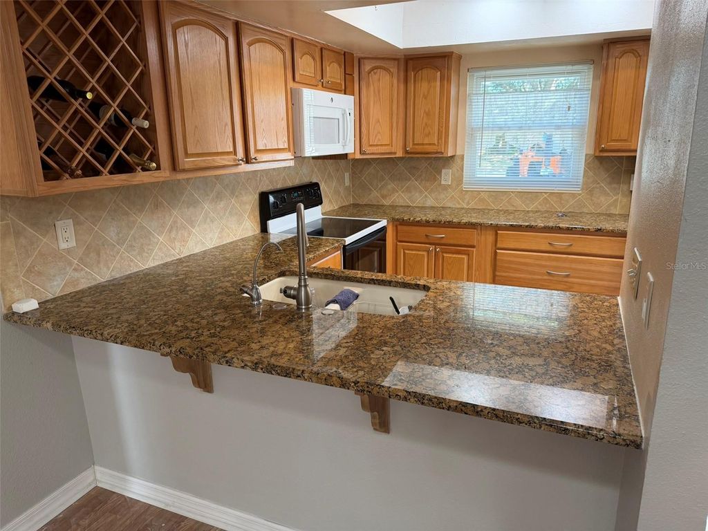 Photo of 5108 Lesher Court, Tampa, FL 33624 (MLS # TB8504625)