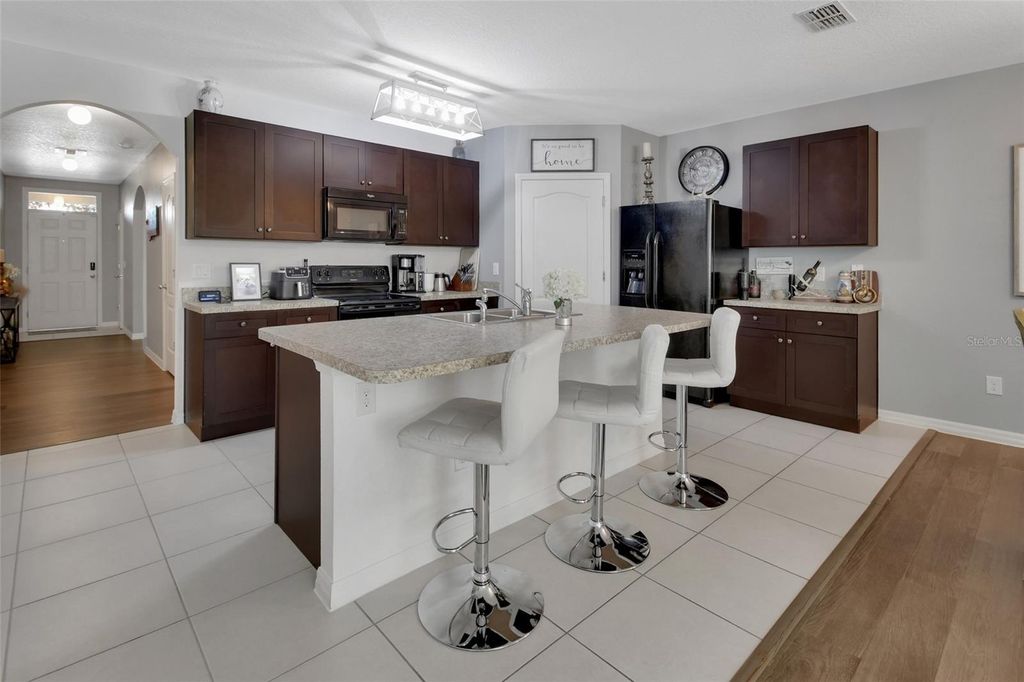 Photo of 813 Oak Hollow Loop, Deland, FL 32724 (MLS # V4946584)