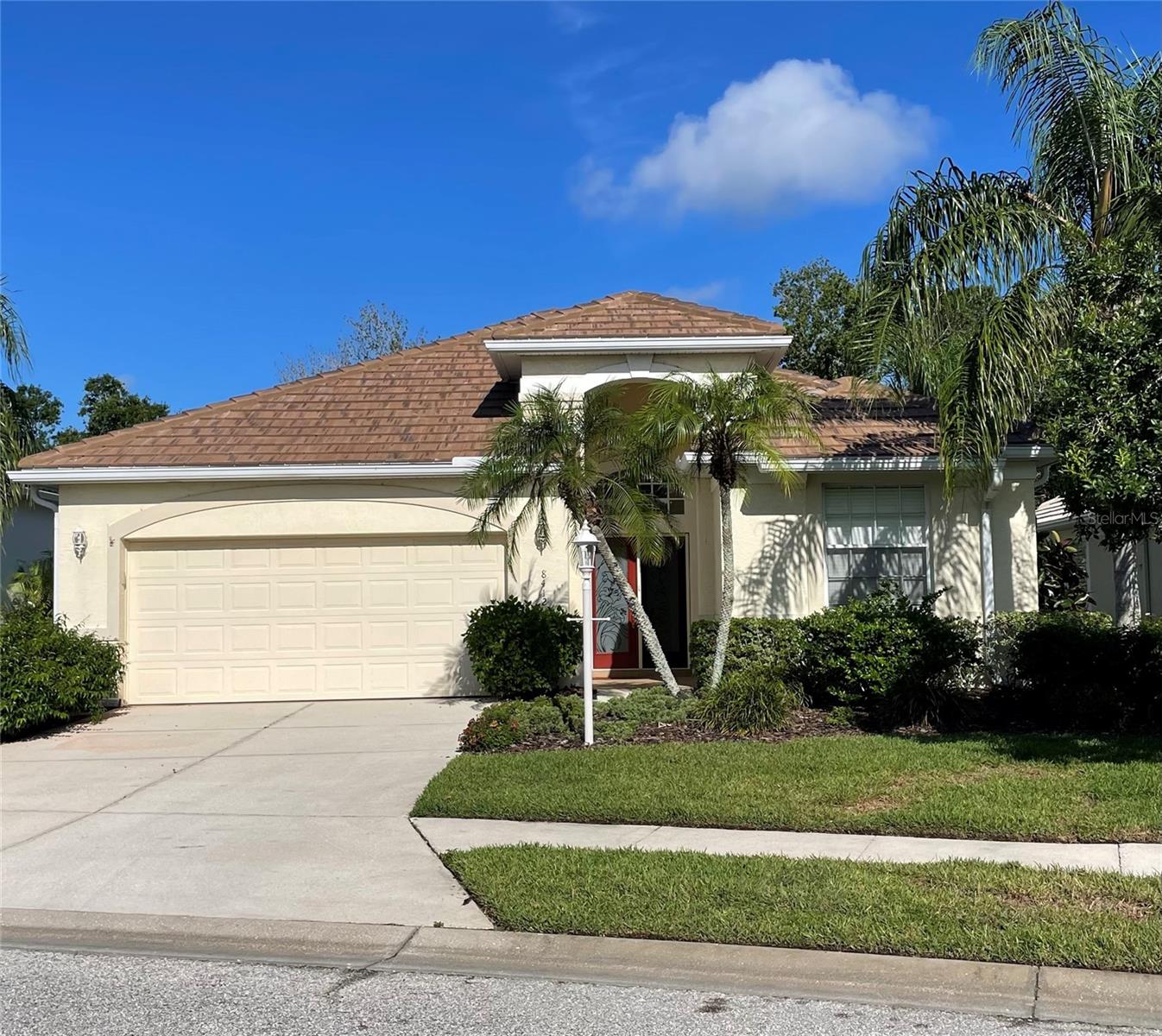 New roof, new price, new pictures, new opportunity! Discover your dream home in the heart of Lakewood Ranch, one of the top-rated master-planned communities in the nation. Nestled in the desirable Edgewater Village, this maintenance-free, gated community offers an unparalleled lifestyle just steps from Lakewood Ranch Main Street, where shopping, dining, and entertainment abound, and surrounded by the natural beauty of Lake Uihlein. NEW ROOF being installed May of 2025. This charming home features a spacious two-bedroom, two-bathroom open floor plan, complemented by high ceilings and elegant laminate wood floors. From the moment you enter through the double glass entry doors, you’ll be captivated by the thoughtfully designed layout. The dining and great rooms overlook a serene preserve area, visible through the oversized, screened lanai, which boasts hurricane roll-down shades for added convenience. The gourmet kitchen offers ample storage, a breakfast bar, and a quaint breakfast nook, all perfectly positioned to capture the peaceful preserve views. The master suite is a retreat of its own, with large windows framing the lush surroundings, two walk-in closets, and a luxurious ensuite bathroom featuring dual vanities and a shower stall. On the opposite side of the home, for added privacy, the second bedroom is situated near an updated bathroom with a modern shower. A versatile den/office, accessed through double doors, provides additional space that can also serve as a third bedroom if desired. Step outside to the oversized screened lanai, a true haven for relaxation or entertaining, complete with a cozy fireplace and natural gas connection BBQ, perfect for enjoying Florida’s year-round sunshine. The community itself is rich with amenities, including a clubhouse, heated pool and spa, scenic walking trails, and a gazebo with a pier, ideal for fishing, kayaking, or simply soaking in breathtaking sunsets over the expansive 3.5-mile Lake Uihlein. Located just minutes from I-75, this home offers easy access to UTC Mall, Sarasota International Airport, top medical facilities, theaters, and the world-renowned Gulf Coast beaches. With A-rated schools and everything you need at your fingertips, this home is the perfect blend of convenience, comfort, and beauty. Call today to schedule your private showing and experience this exceptional property for yourself!