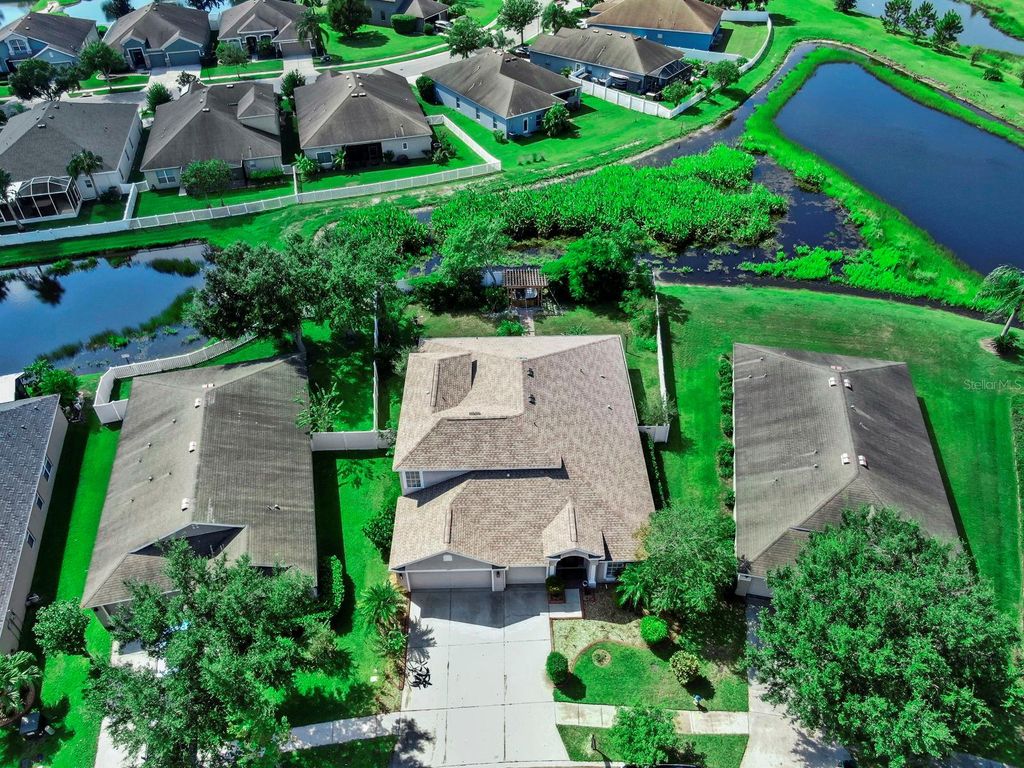 Photo of 6921 Runner Oak Drive, Wesley Chapel, FL 33545 (MLS # TB8428184)