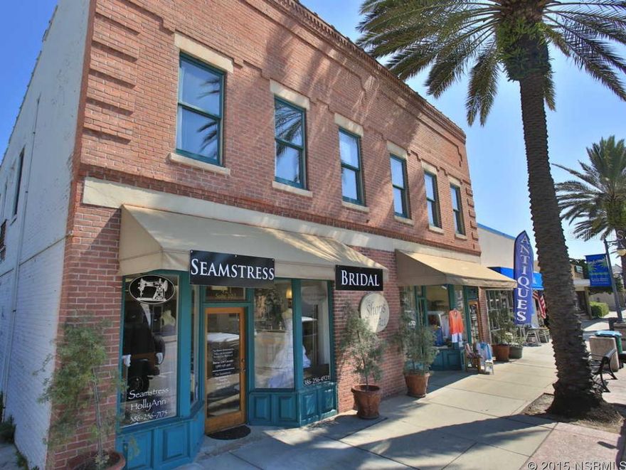 Historic Building 2 story retail/residential in Downtown New Smyrna Beach. Constructed in 1916 and totally renovated in 2001 and a new roof in 2007. 2900+/- on First Floor and 2,550 +/- on 2nd floor. First floor is divided into two retails spaces with the East unit comprised of approx 1300 sq ft (owner occupied) and the west unit comprises approx 1,100 sq ft. (currently rented for $1200/month) The remainder of the 1st floor consists of common hallways, stairwell and storage. The 2nd floor is divided into two 1 bedroom/one bath apartments that are approx 800 sq ft each. Also Office/studio of approx 650 st ft currently rented for $975/month. The remainder of the 2nd floor consist of common areas, a stairwell with electric chair lift and common laundry area. Each unit is individually metered and has it's own roof mounted central heat and air conditioning.  2nd floor also has the original Florida Heart Pine floors restored.  Exposed original brick thru out the building.  50 foot frontage and 110 deep.Ingress and Egress by way of an alley way easement off North Orange and Canal Street Parking; there is also a driveway north of the alley; there are 6 parking spots for owners and tenants. Currently Owner Occupied.  Possibly Gross Income $6000/month. ;Water: City