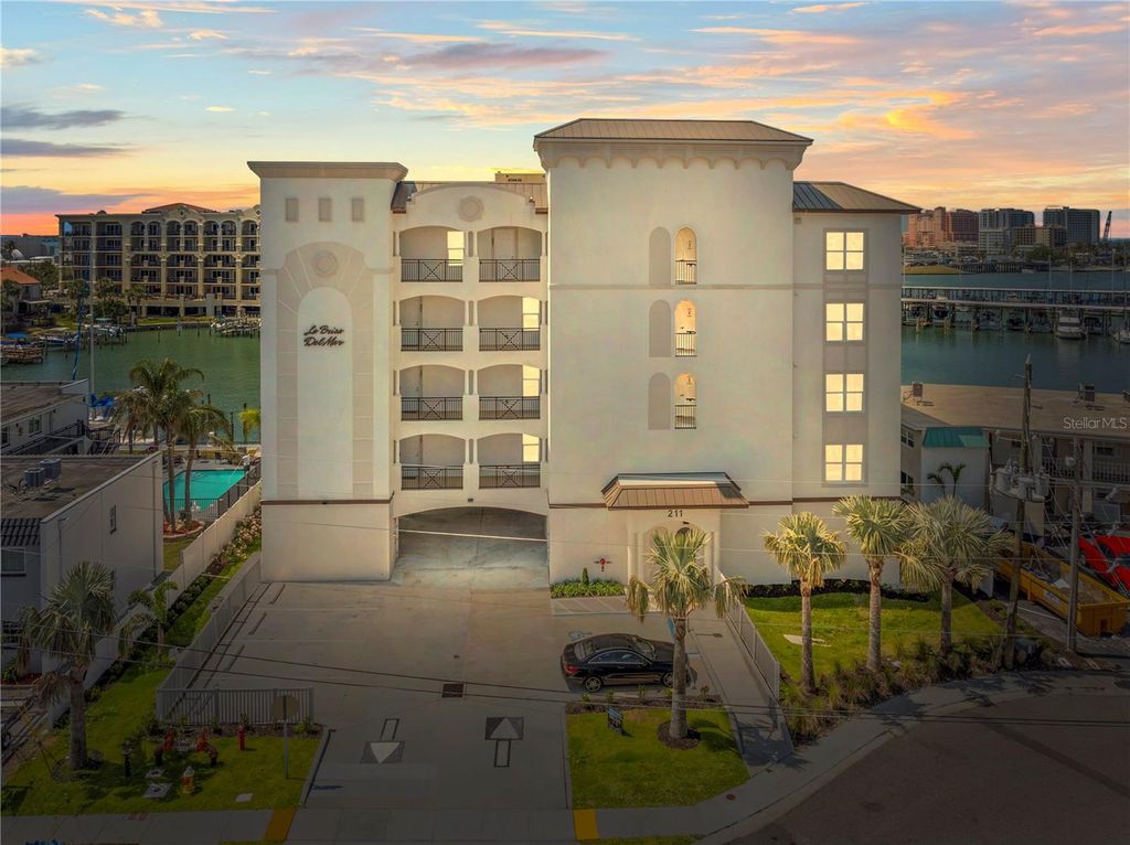 Photo of 211 Dolphin Point #403, Clearwater Beach, FL 33767 (MLS # TB8376019)