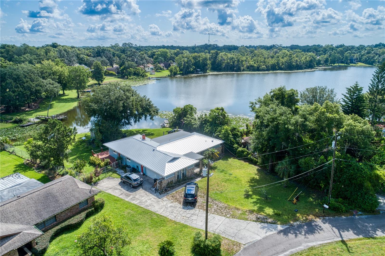 Welcome to 317 Park Place, a beautifully maintained 3-bedroom, 2-bathroom single-family home located on the tranquil shores of Lake Adelaide in Altamonte Springs. This charming home offers a rare opportunity to enjoy peaceful lakefront living while remaining conveniently close to shopping, dining, parks, and major highways.
Situated at the end of a quiet cul-de-sac, the home features a spacious and light-filled interior with an open floor plan designed for comfortable everyday living. The kitchen offers ample cabinet and counter space and flows seamlessly into the living and dining areas, ideal for both relaxing and entertaining. The split-bedroom layout provides privacy, with the primary suite offering its own en-suite bathroom and serene lake views.
Step outside to a generously sized backyard that overlooks Lake Adelaide. Lake Adelaide is a 21-acre lake in the Little Wekiva Watershed, Whether you're enjoying your morning coffee by the water, launching a kayak, or simply taking in the sunset, this backyard is your private retreat. Additional features include a large safe, interior laundry room with washer and dryer included, and ceiling fans throughout.
Located just minutes from Cranes Roost Park, Uptown Altamonte, AdventHealth, and with easy access to I-4, this home combines lakeside serenity with everyday convenience. Lawn care is included, and pets may be considered on a case-by-case basis.
Schedule your private tour today!